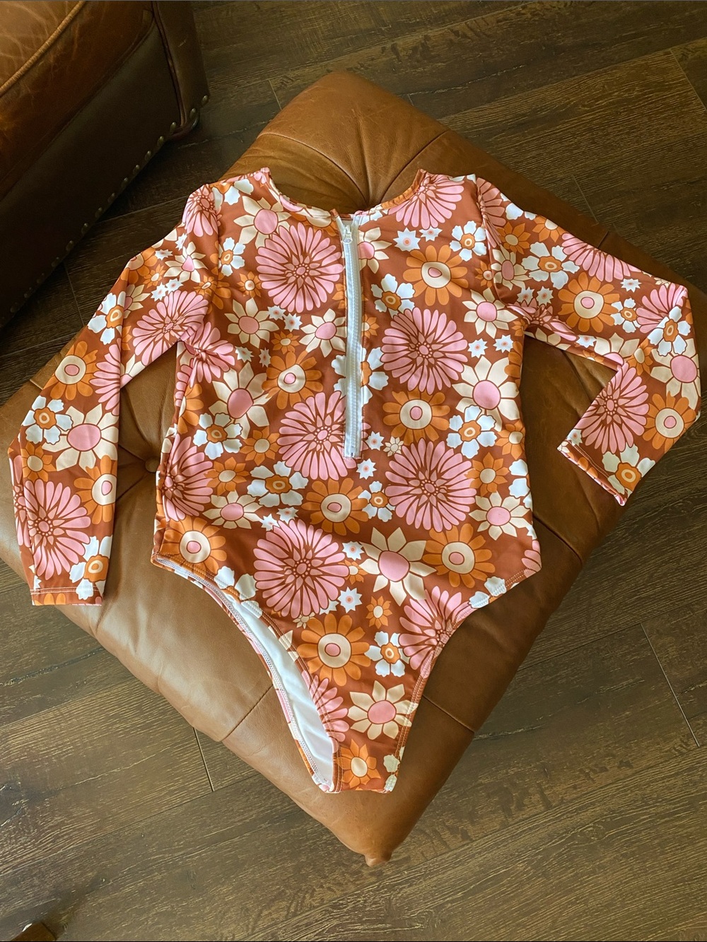 Women’s One-Piece Swimsuit in a size small and a medium.
